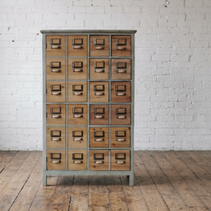 An apothecary cabinet with multiple drawers and a cupboard - Cambrewood
