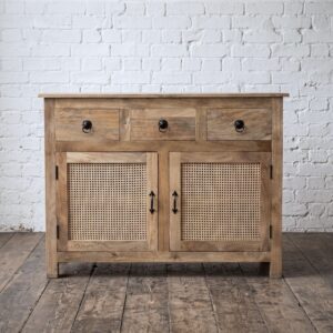 A rattan and solid wood sideboard with cupboard storage below 3 pull out drawers - Cambrewood