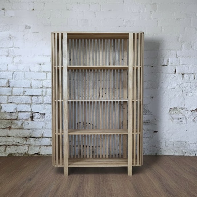 A large booskshelf made from rustic reclaimed wood.