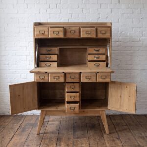 Apothecary cabinet with pull down desk, multiple drawers in light coloured wood - Cambrewood