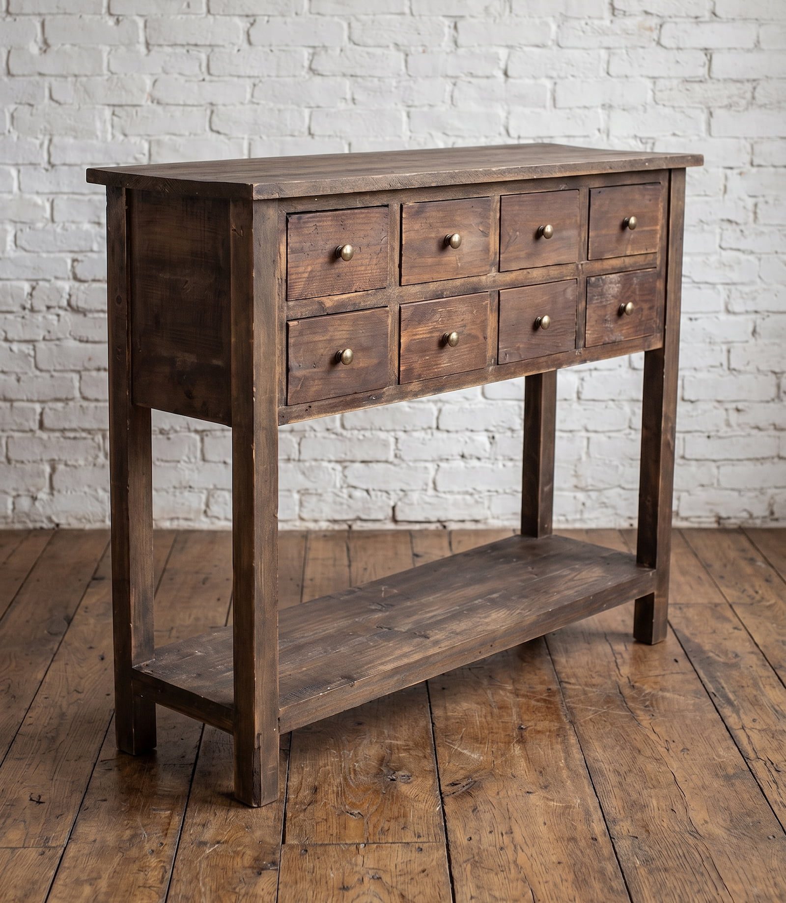 A rustic wooden console table style apothecary cabinet with multiple drawers - Cambrewood