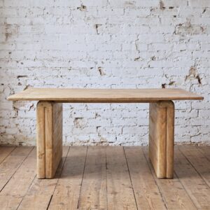 The table features a minimalist, contemporary design defined by soft architectural curves - natural wood, Scandi 6-8 seater dining table- Cambrewood